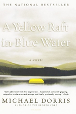 A yellow raft in blue water