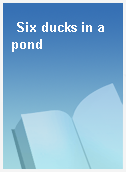 Six ducks in a pond